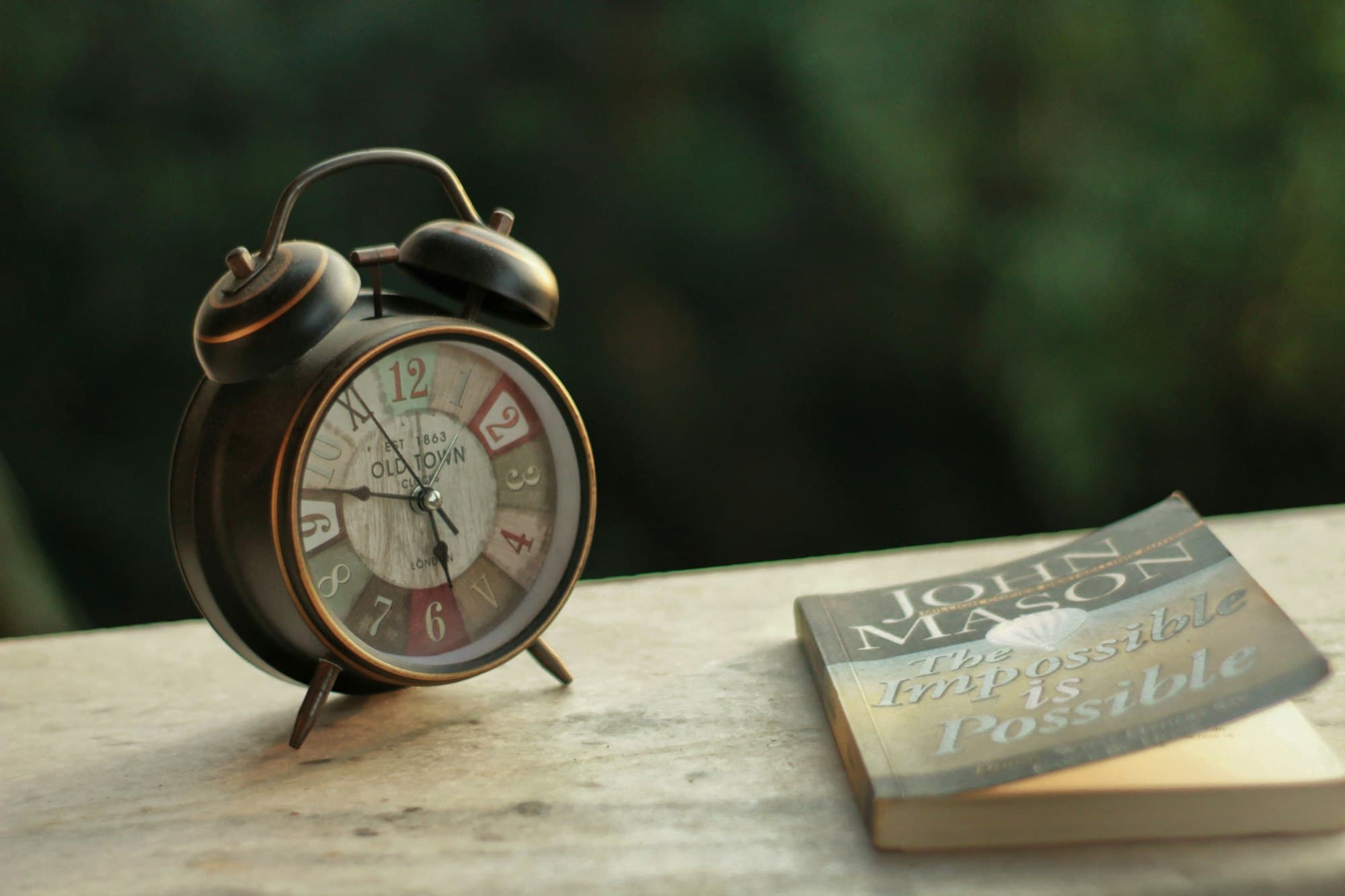 Alarm clock on a bedside table at night