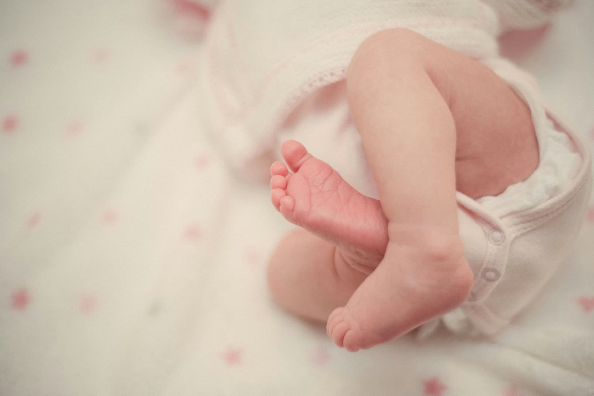 A sleeping newborn baby