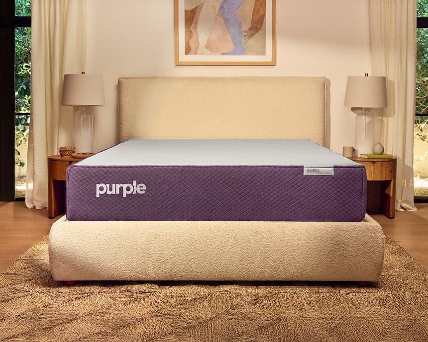 Purple RestorePremier hybrid mattress on a modern platform bed