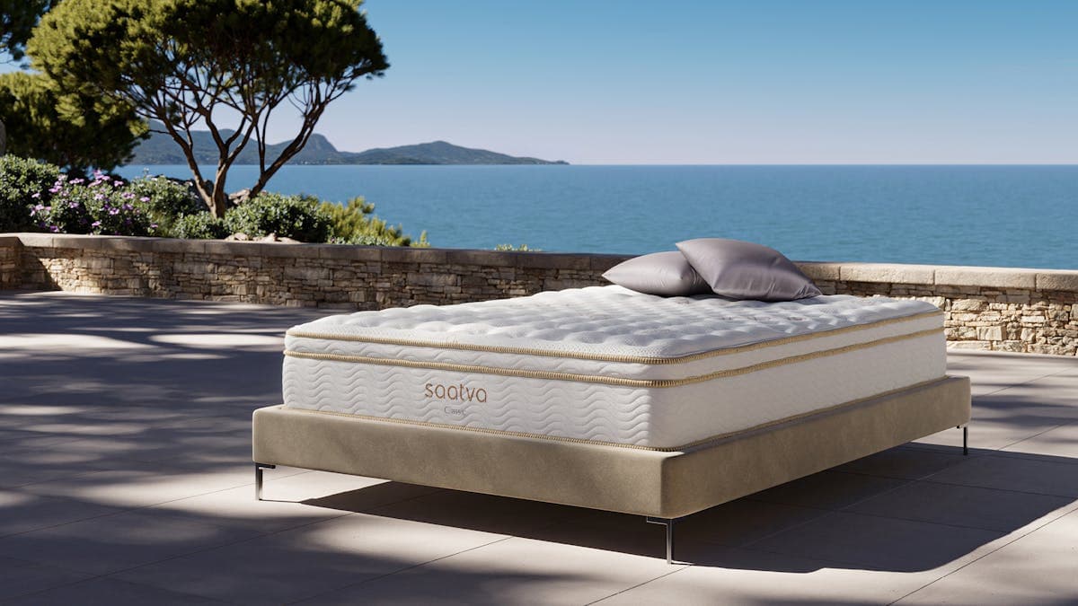Saatva Classic luxury innerspring mattress in a bright bedroom